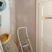 Wet plastering to blend in the old and new